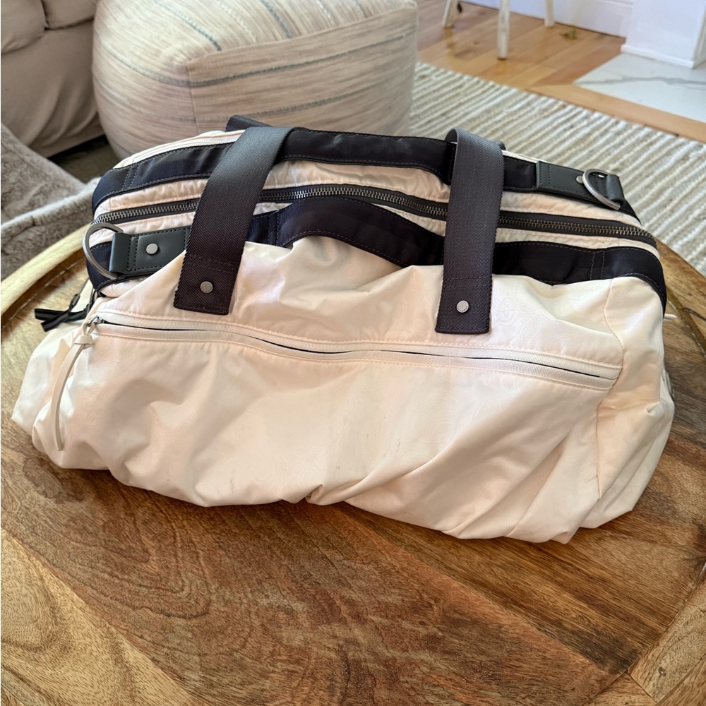 lululemon Go the Distance Cream and Black Travel Duffel 2011-2014